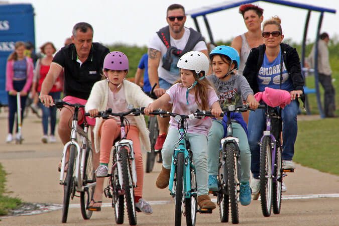 IMR Family Biking on beach